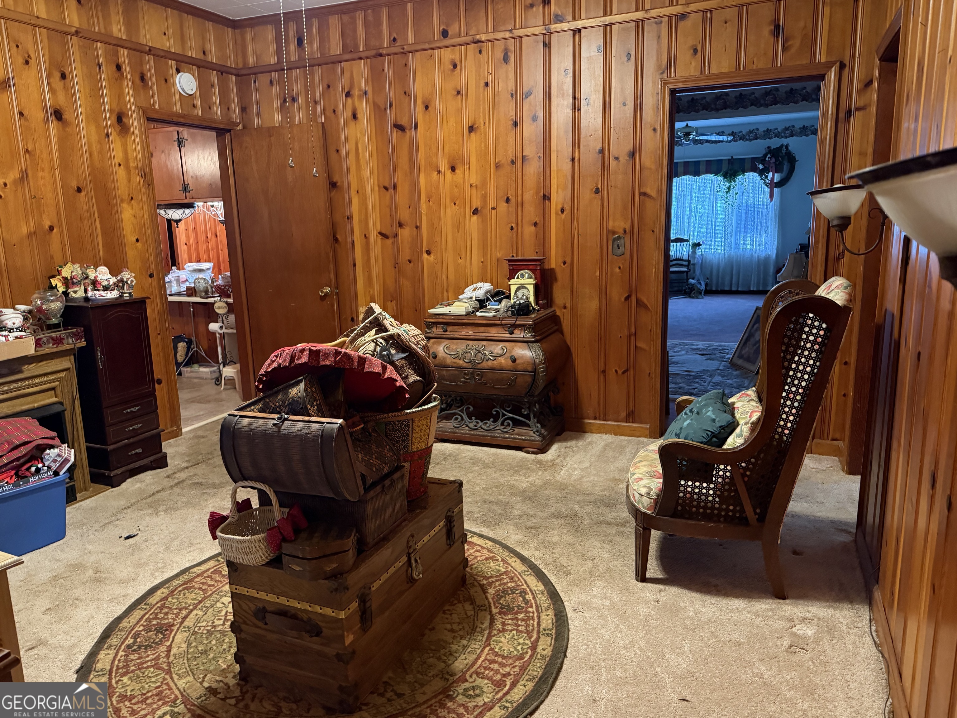 641 South Masonic Street Millen, GA 30442 - Photo 10 of 20 a living room with furniture and a couch