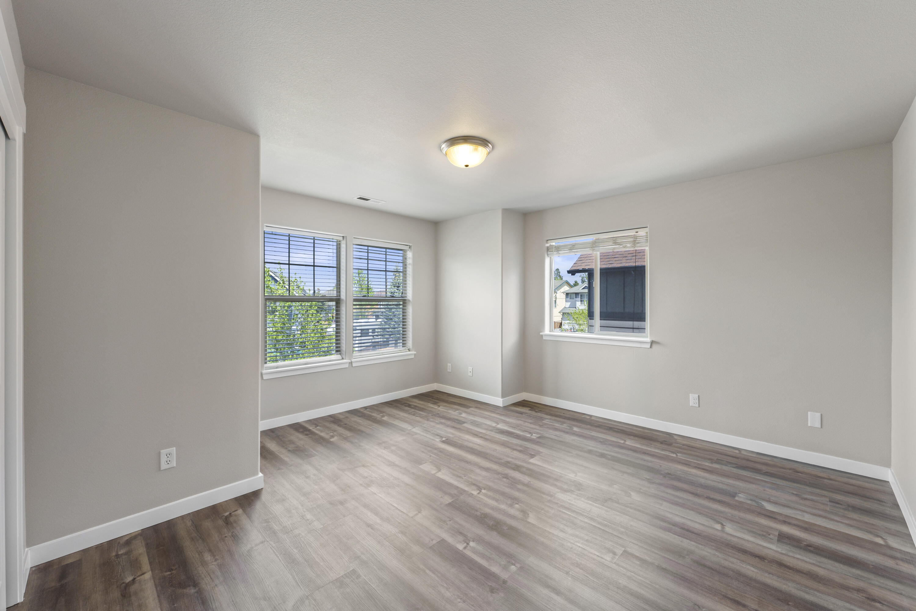 21189 Ritz Place Bend, OR 97702 - Photo 31 of 37 wooden floor in an empty room with a window