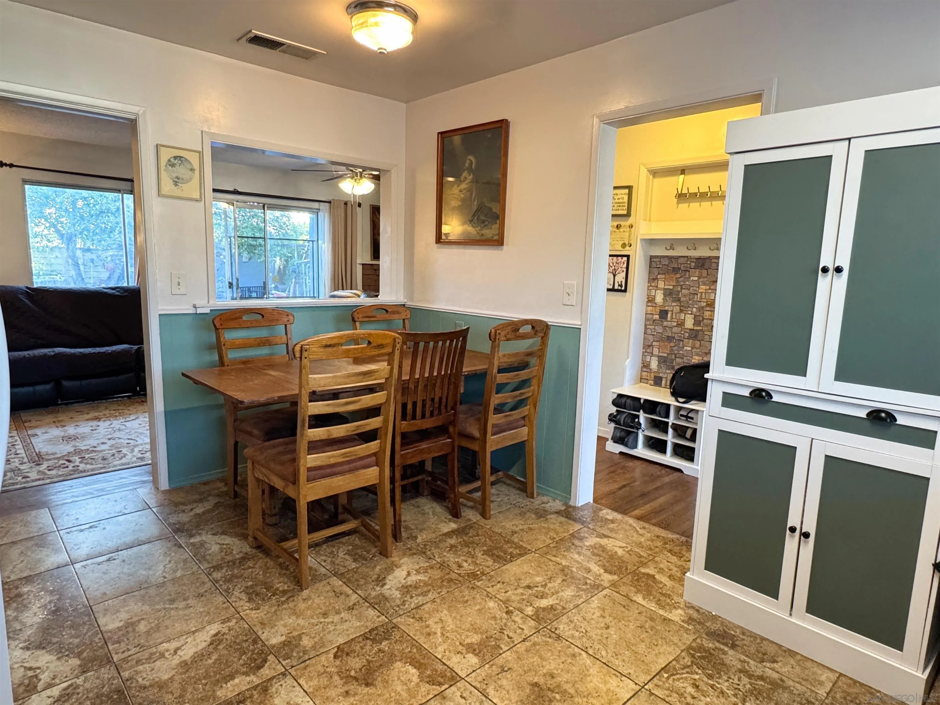1117 Kings Road Escondido, CA 92027 - Photo 12 of 37 a bed room with a bed and a desk
