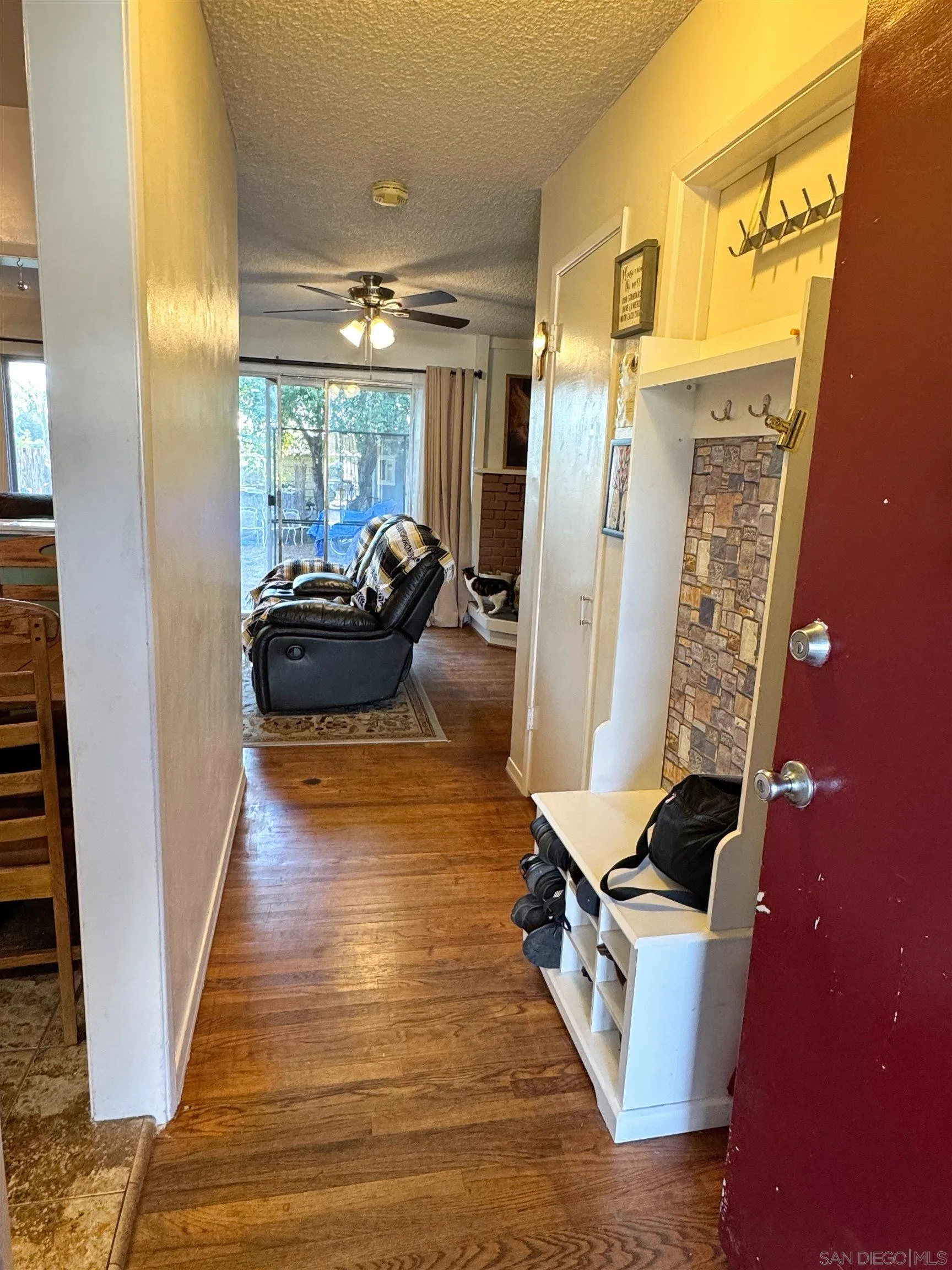 1117 Kings Road Escondido, CA 92027 - Photo 4 of 37 a living room with furniture and a fireplace