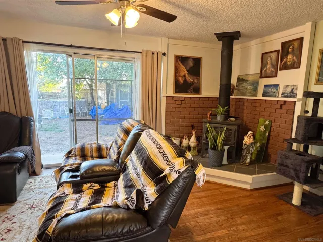 a view of a livingroom with furniture and windows