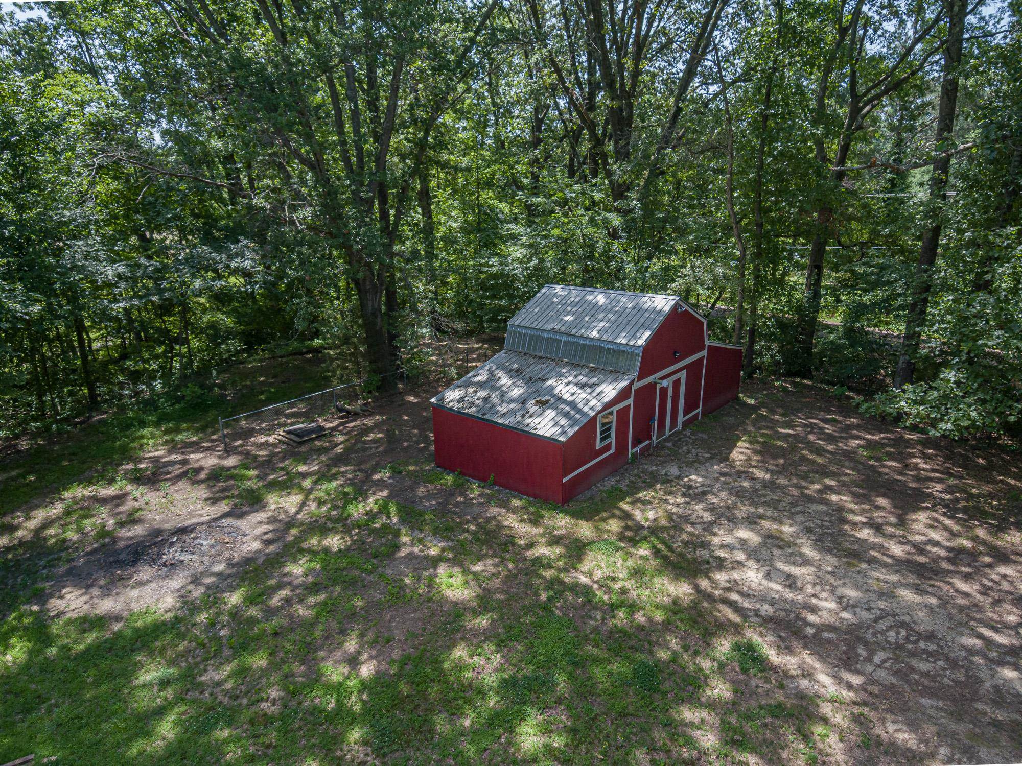 10860 Macedonia Road Brighton, TN 38011 - Photo 24 of 24 a view of a wooden deck with a yard