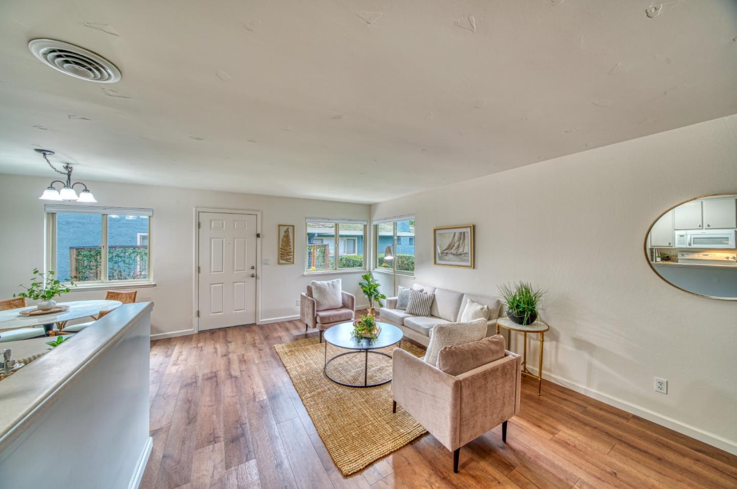 1380 Ruby Court, Unit 2 Capitola, CA 95010 - Photo 13 of 38 a living room with furniture and wooden floor