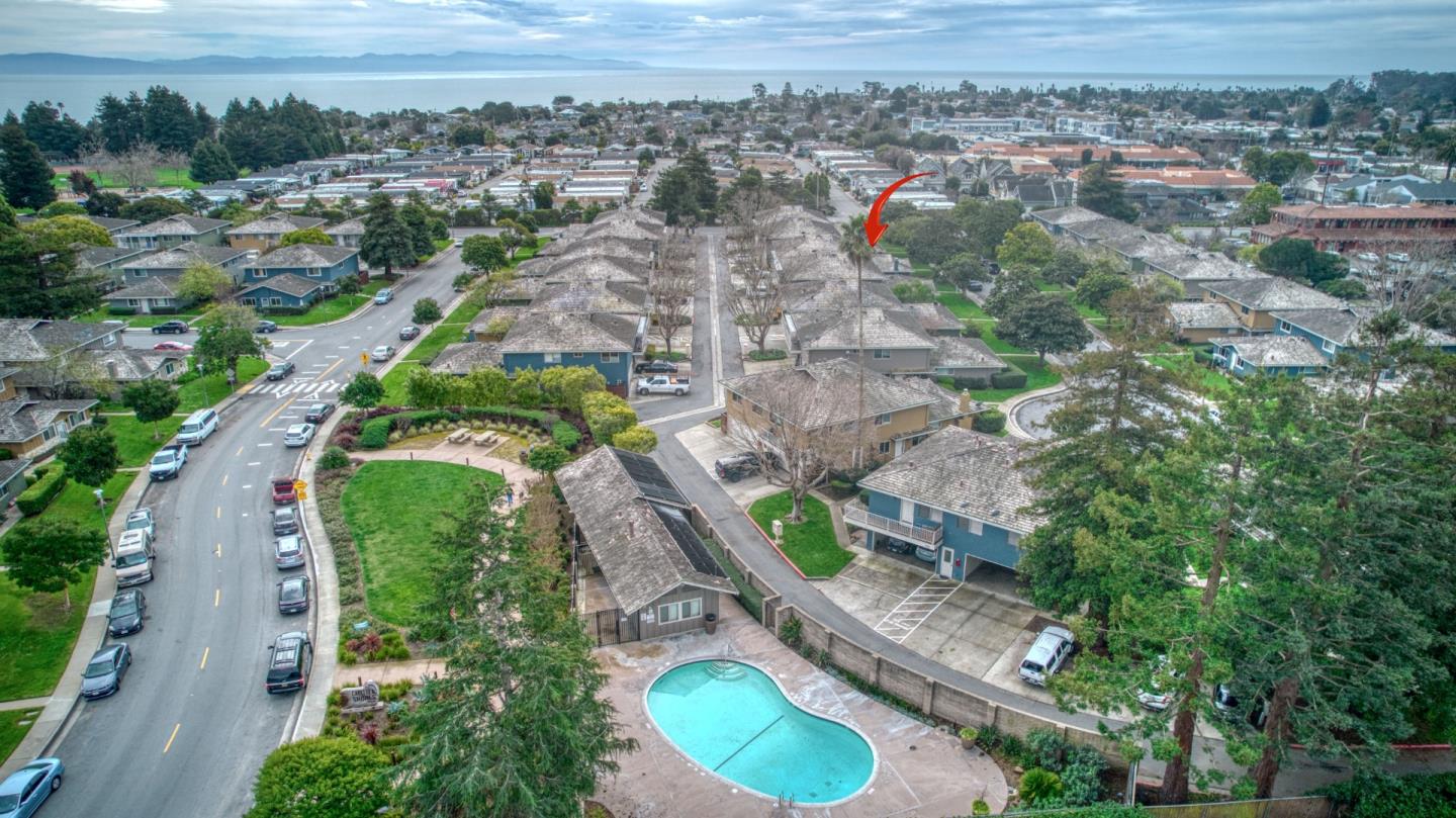 1380 Ruby Court, Unit 2 Capitola, CA 95010 - Photo 2 of 38 an aerial view of a house with a yard and lake view