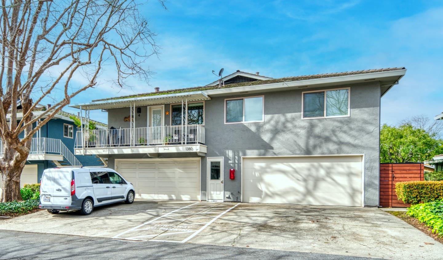 1380 Ruby Court, Unit 2 Capitola, CA 95010 - Photo 25 of 38 a car parked in front of a white house