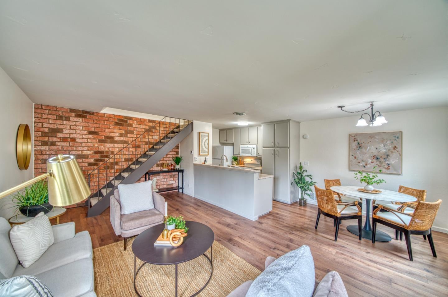 1380 Ruby Court, Unit 2 Capitola, CA 95010 - Photo 4 of 38 a living room with furniture and a wooden floor