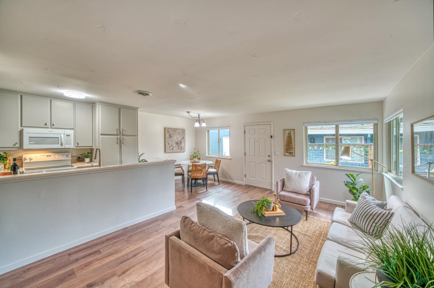 1380 Ruby Court, Unit 2 Capitola, CA 95010 - Photo 8 of 38 a living room with furniture and a wooden floor