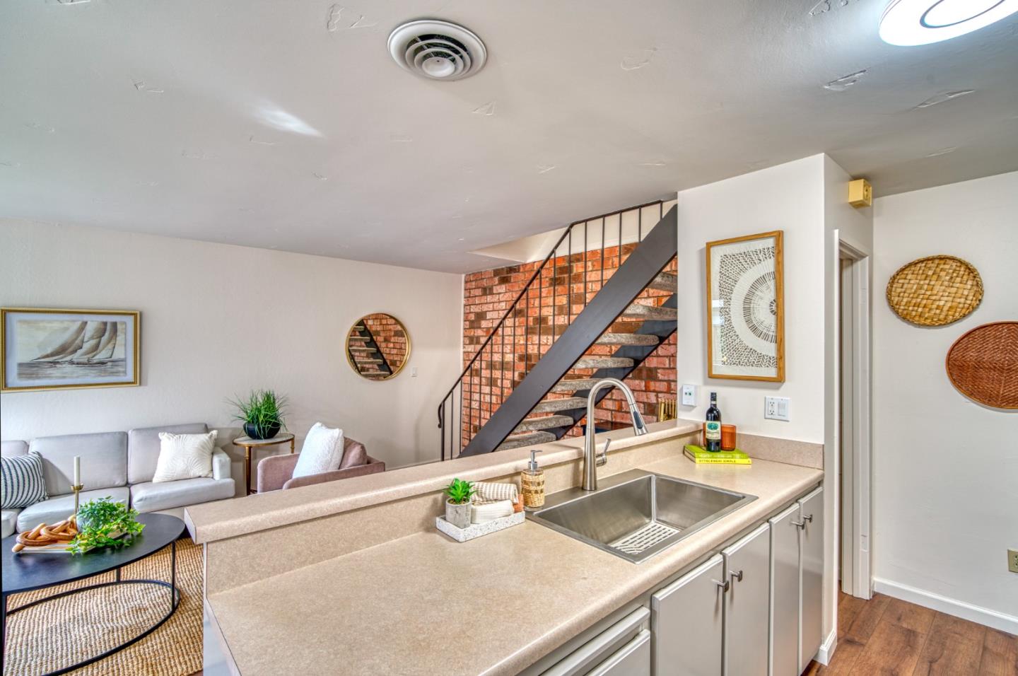 1380 Ruby Court, Unit 2 Capitola, CA 95010 - Photo 10 of 38 a kitchen with a sink and a stove