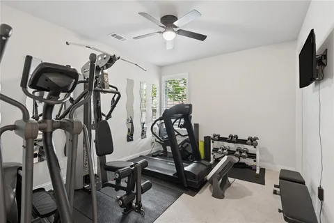 a view of a room with gym equipment