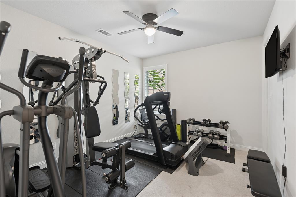 416 Winding Ridge Trail Southlake, TX 76092 - Photo 18 of 34 First floor bedroom currently being used as an exercise room