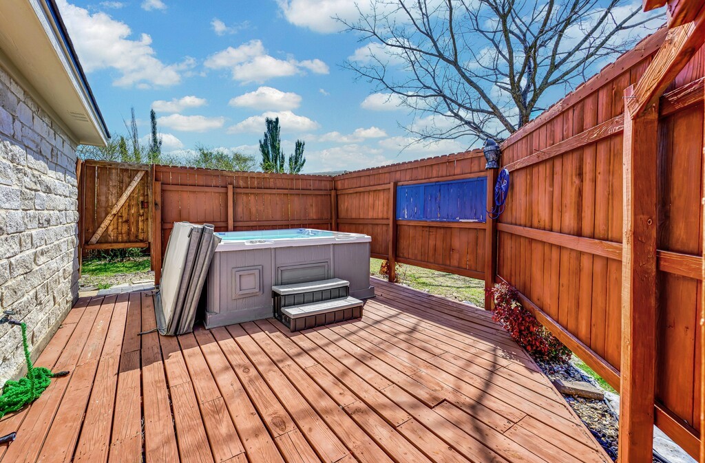 621 South Ruidoso Downs Drive Robinson, TX 76706 - Photo 31 of 41 a view of a wooden deck with a yard