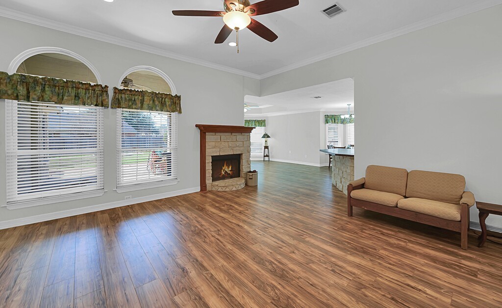 621 South Ruidoso Downs Drive Robinson, TX 76706 - Photo 4 of 41 a living room with furniture and a fireplace