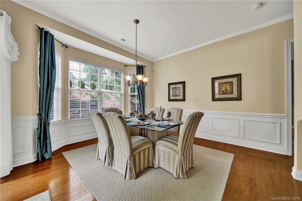 1336 Secret Path Drive Fort Mill, SC 29708 - Photo 12 of 27 a view of a dining room with furniture window and wooden floor