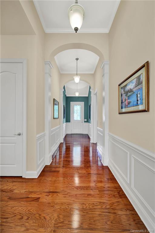 1336 Secret Path Drive Fort Mill, SC 29708 - Photo 3 of 27 a view of a room with wooden floor and staircase