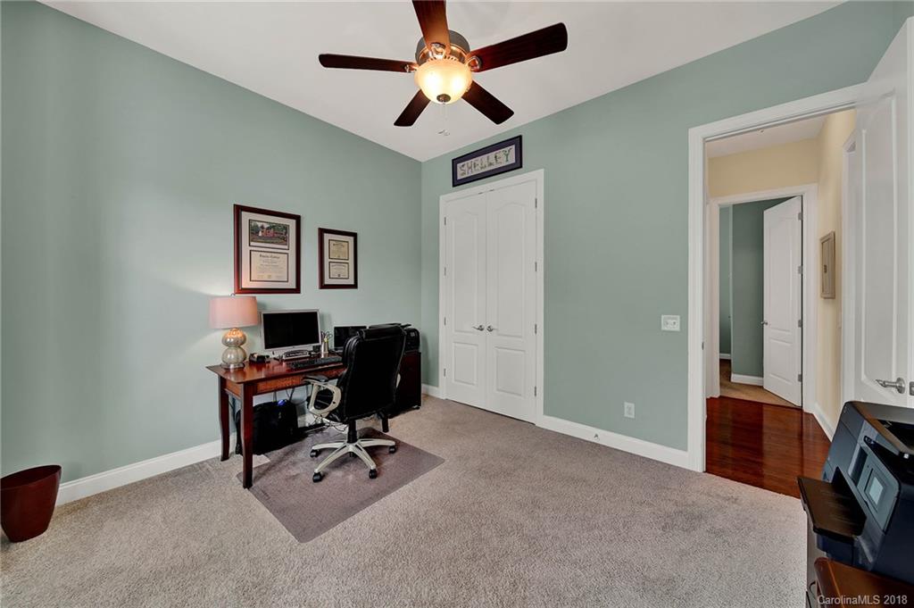 1336 Secret Path Drive Fort Mill, SC 29708 - Photo 21 of 27 a view of a workspace with furniture and a window
