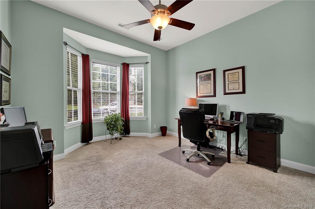 1336 Secret Path Drive Fort Mill, SC 29708 - Photo 22 of 27 a view of a workspace with furniture and a window