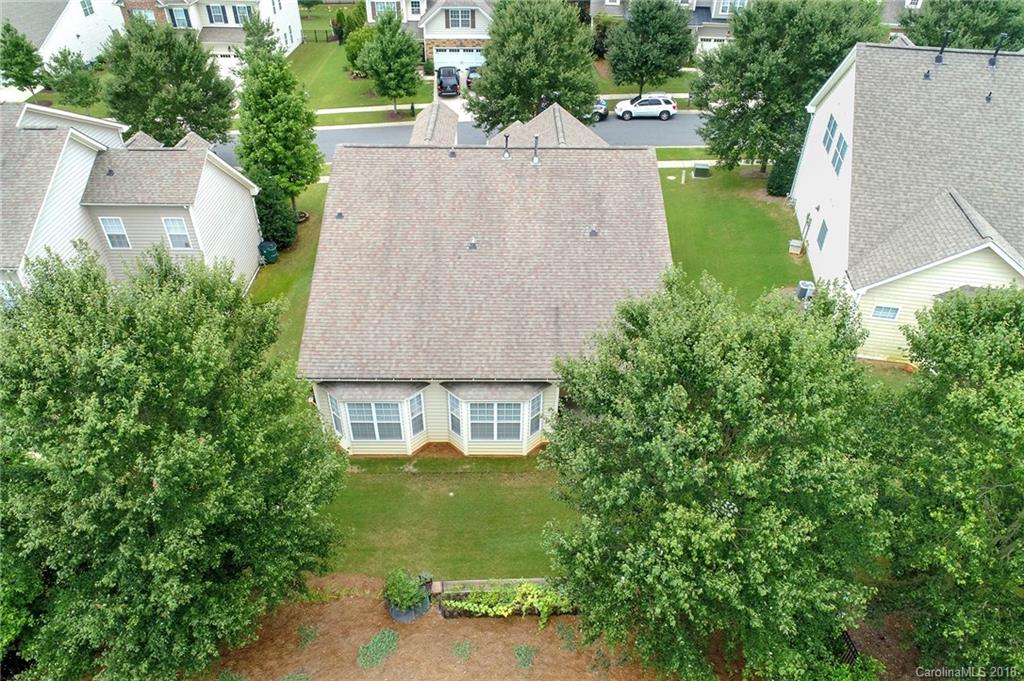 1336 Secret Path Drive Fort Mill, SC 29708 - Photo 26 of 27 an aerial view of a house with a yard and trees all around