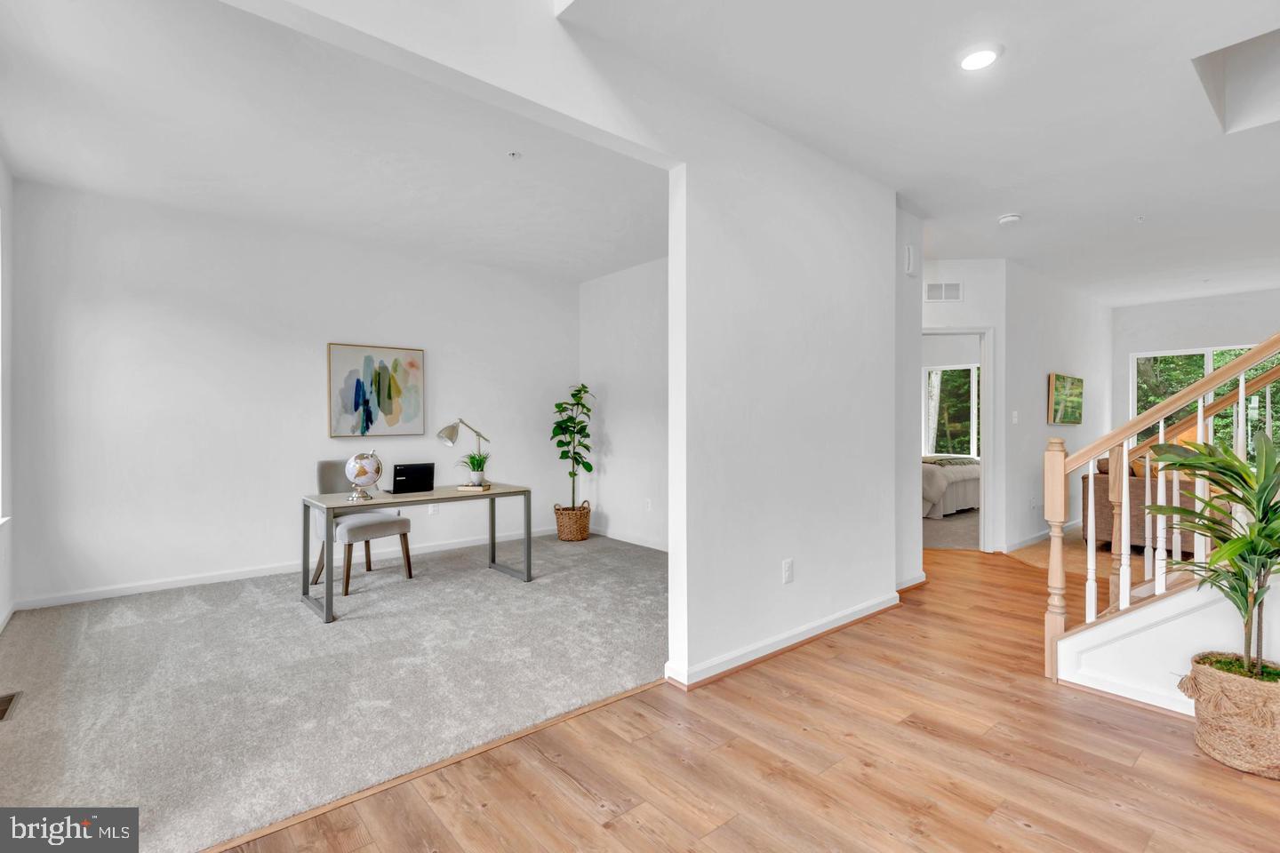 6606 Lost Fox Lane Hanover, MD 21076 - Photo 7 of 19 a view of a livingroom with furniture and wooden floor