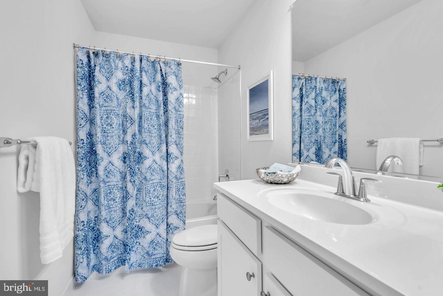 6606 Lost Fox Lane Hanover, MD 21076 - Photo 8 of 19 a bathroom with a sink toilet and shower