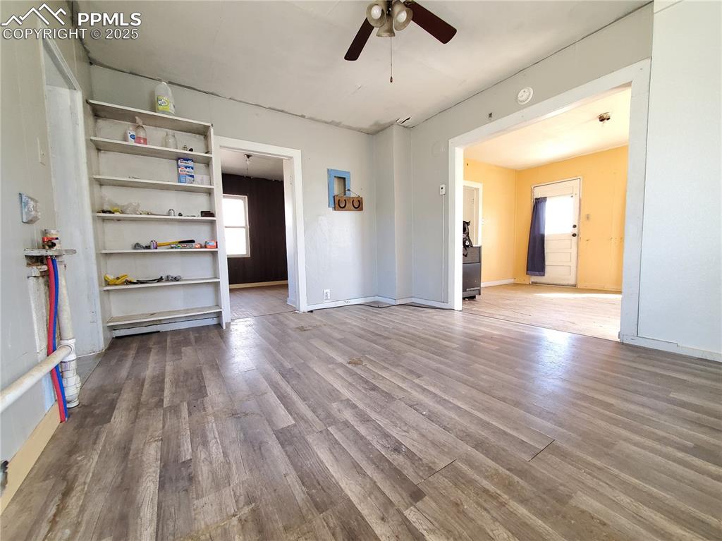 102 South 12th Street Lamar, CO 81052 - Photo 15 of 28 wooden floor in an empty room