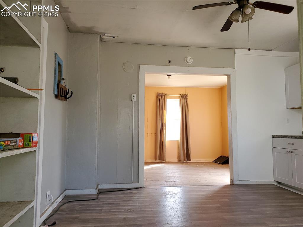 102 South 12th Street Lamar, CO 81052 - Photo 21 of 28 a view of empty room with wooden floor