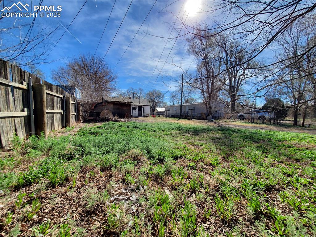 102 South 12th Street Lamar, CO 81052 - Photo 27 of 28 a view of a yard with a house
