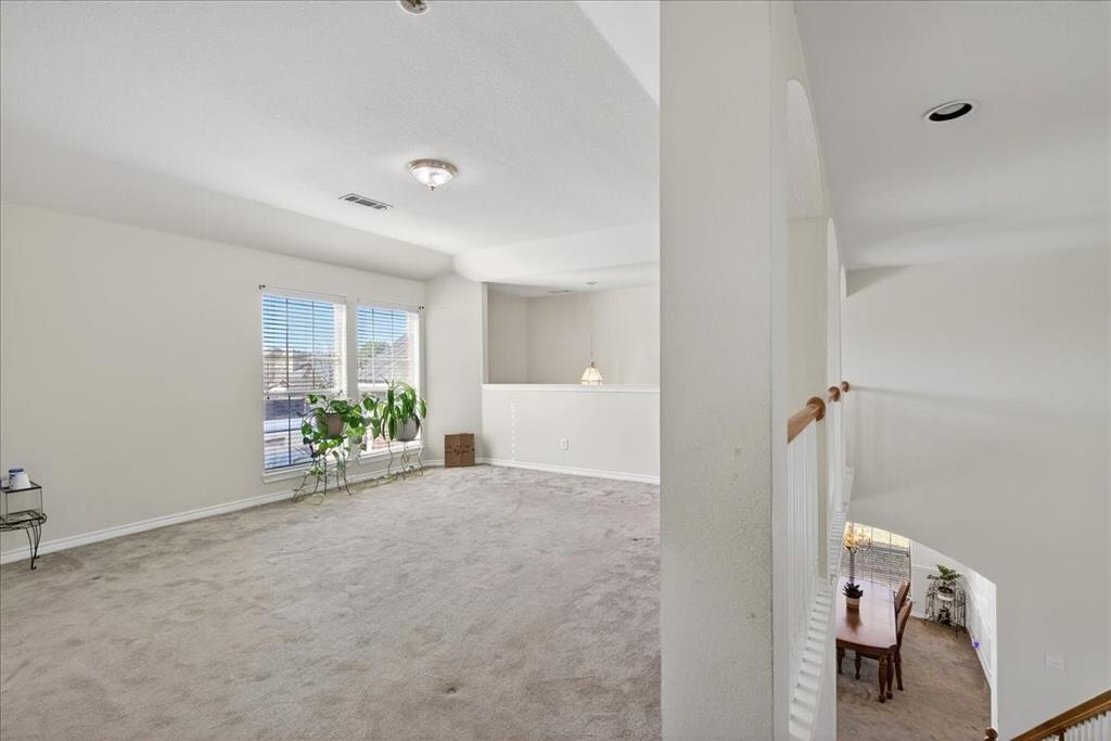7308 Hawk Lane Sachse, TX 75048 - Photo 21 of 37 a view of an empty room and a window
