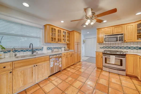 a spacious bathroom with a double vanity sink mirror and