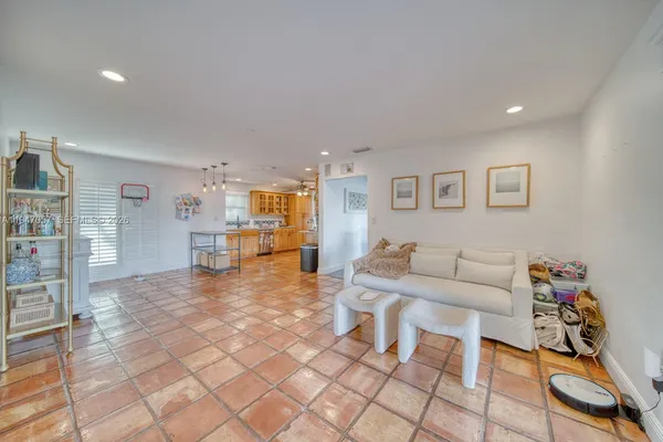 a living room with furniture and a table
