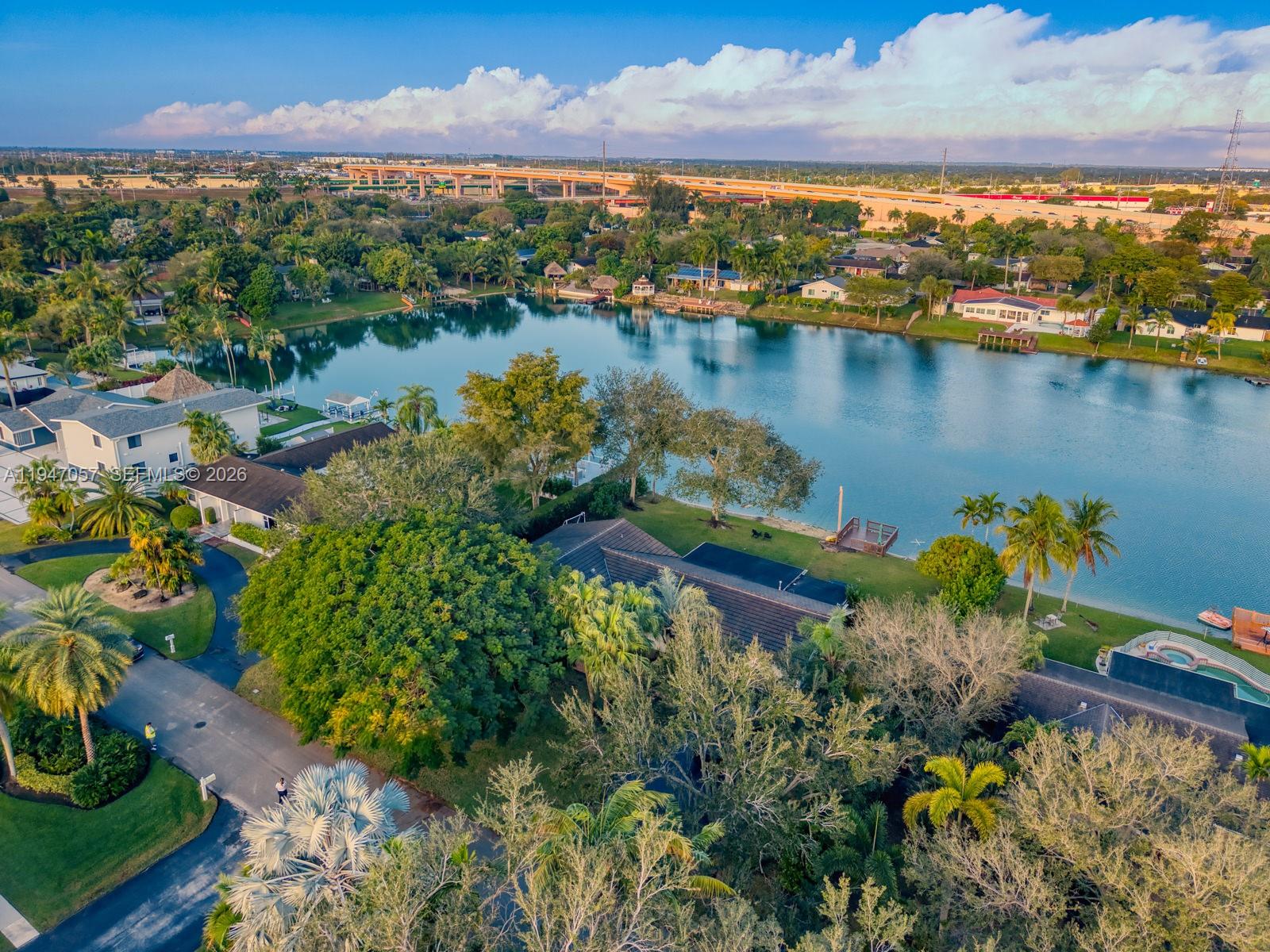 12620 Southwest 114th Avenue Miami, FL 33176 - Photo 34 of 37 a view of a lake with a city
