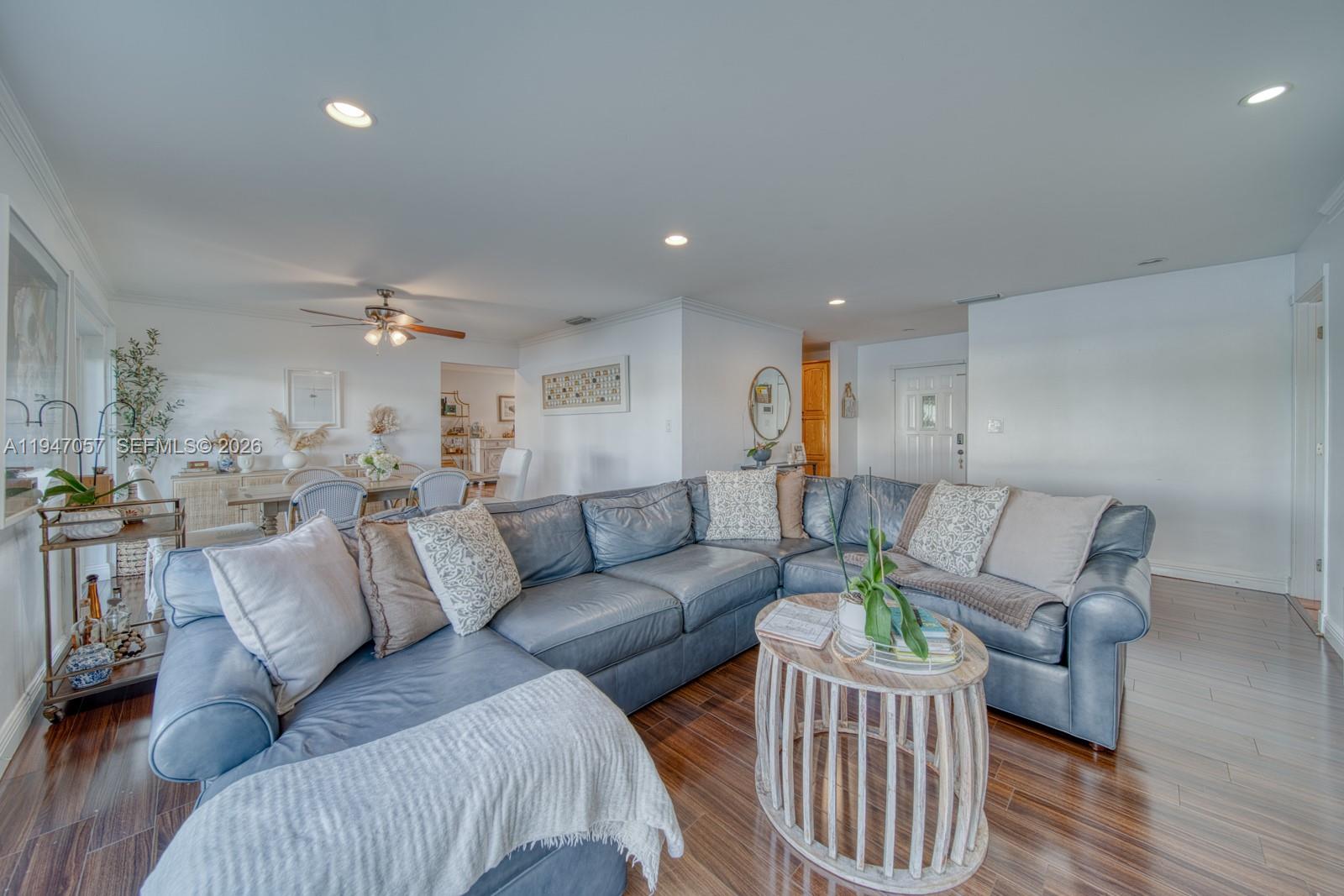 12620 Southwest 114th Avenue Miami, FL 33176 - Photo 5 of 37 a living room with furniture and wooden floor