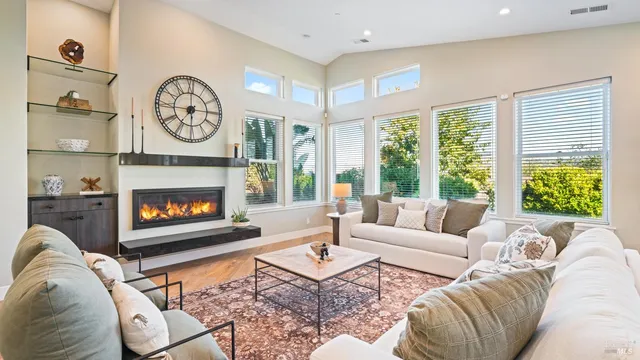 a living room with furniture or couch and a wooden floor