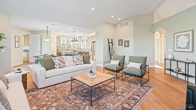 a kitchen with granite countertop a sink and a stove