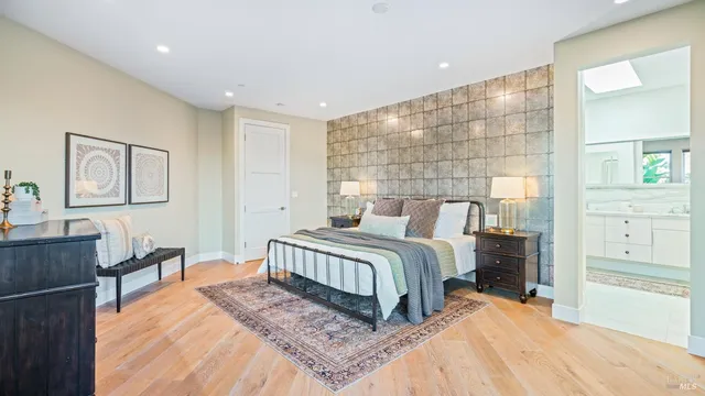 a view of a livingroom with furniture and a window