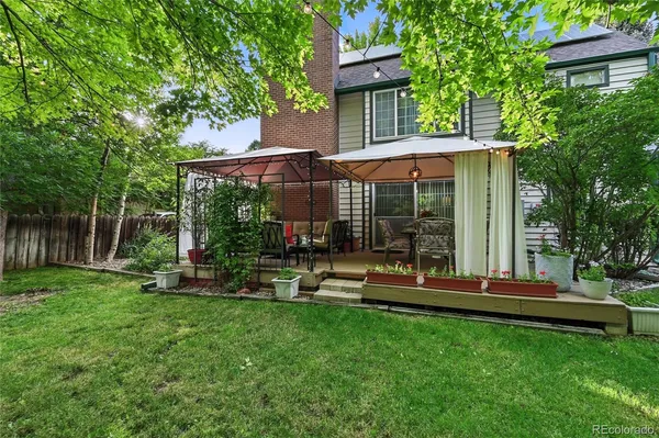 a outdoor living space with furniture and garden view