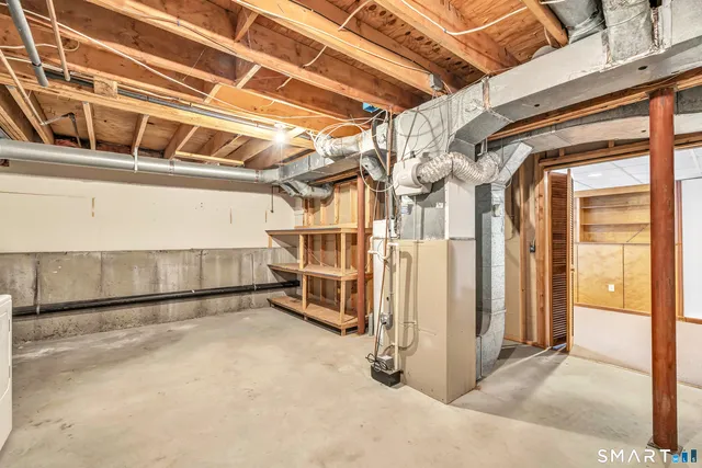 a view of a room with wooden walls
