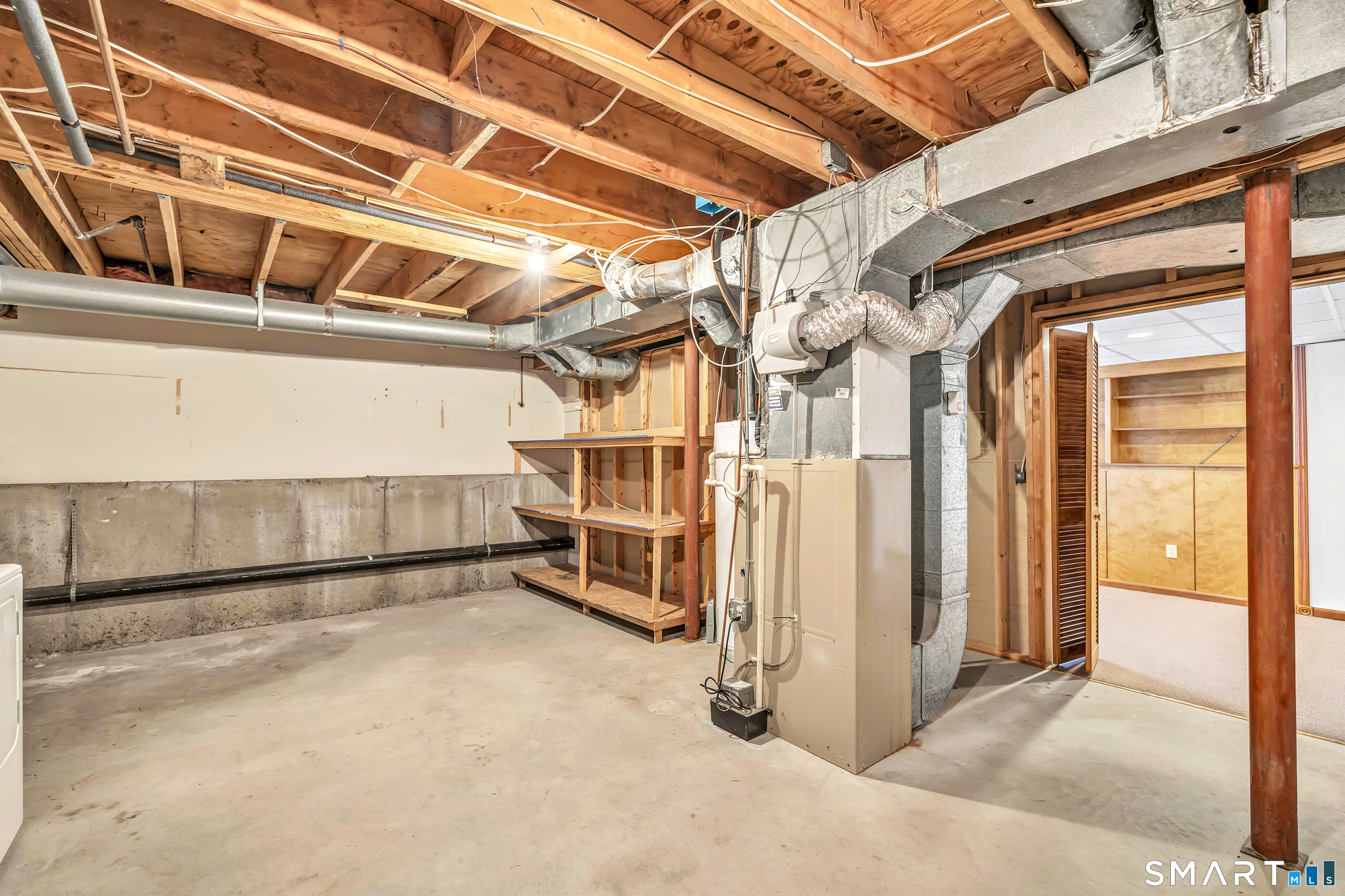 675 Townsend Avenue, Unit 104 New Haven, CT 06512 - Photo 12 of 40 a view of a room with wooden walls