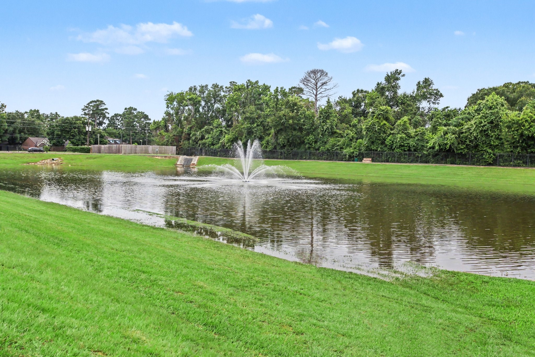2903 Swift Brook Glen Way Spring, TX 77389 - Photo 27 of 30 Beautiful community entrance features a peaceful pond with a fountain and a walking trail.