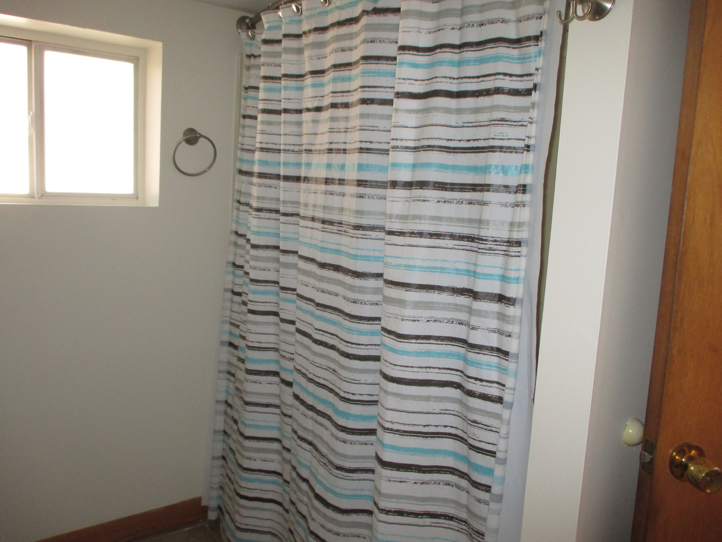 3902 Claire Boulevard Midlothian, IL 60445 - Photo 7 of 14 a bathroom with a shower and a sink