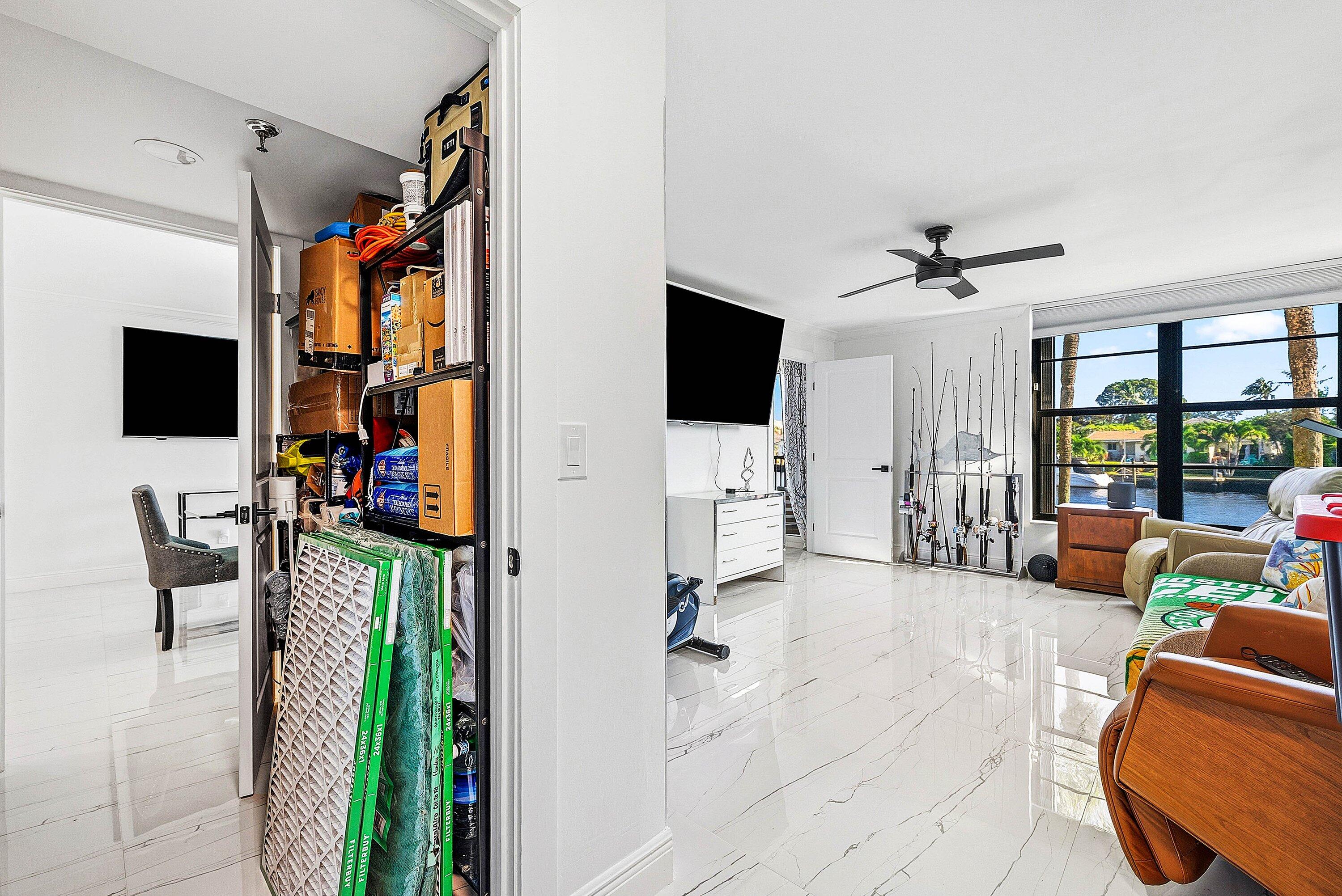 18 Royal Palm Way, Unit 109 Boca Raton, FL 33432 - Photo 24 of 43 a view of living room with furniture and a flat screen tv