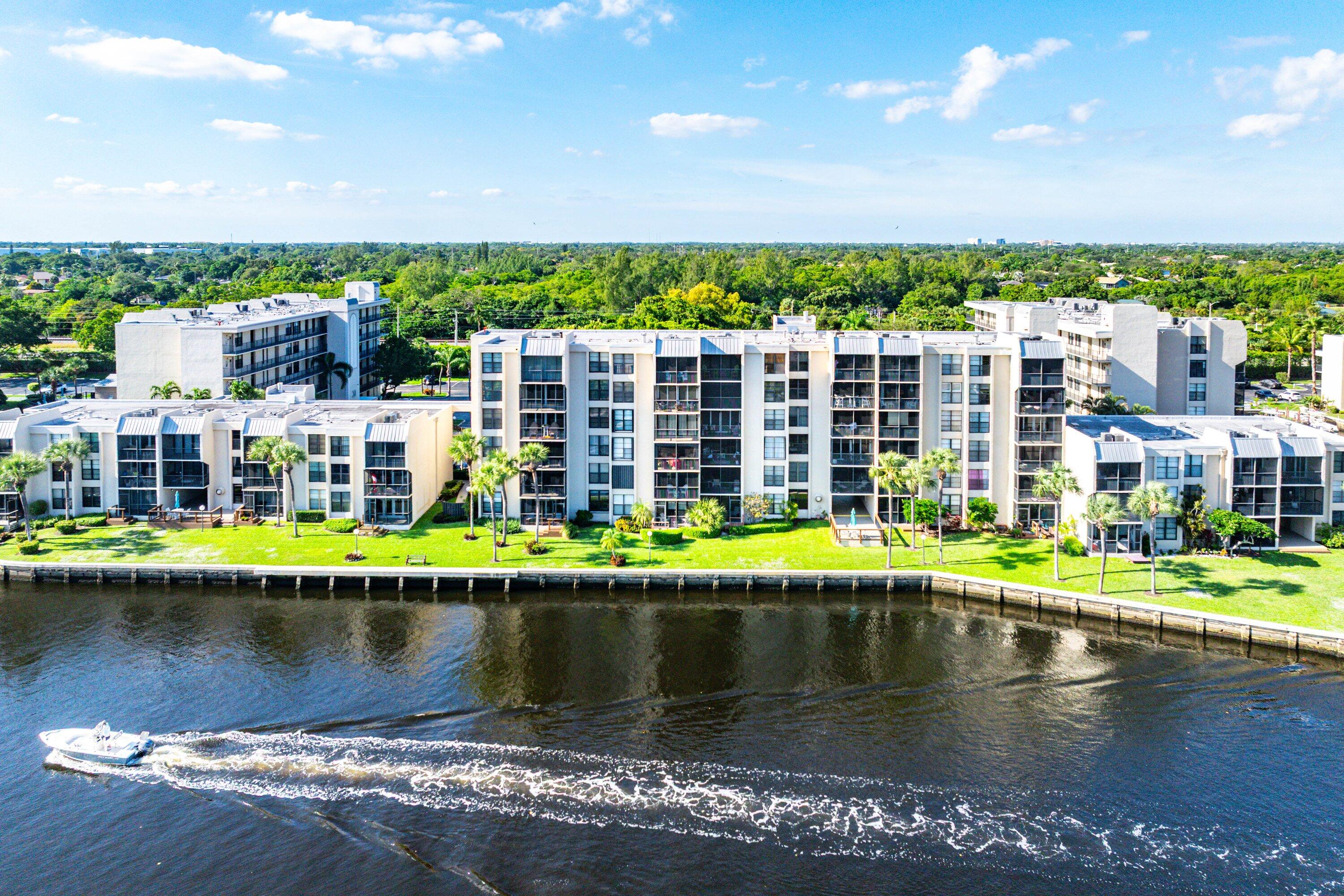 18 Royal Palm Way, Unit 109 Boca Raton, FL 33432 - Photo 36 of 43 a view of swimming pool with a lake view