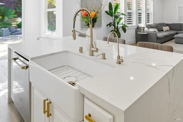 a view of a house with backyard sitting area and porch