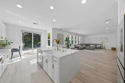 a view of a backyard with sitting area and furniture