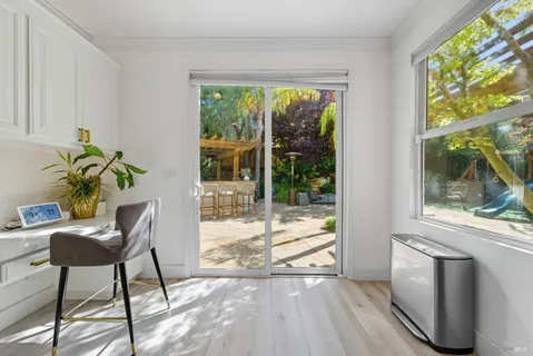 a view of a house with basketball court