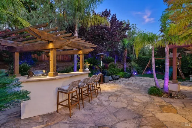 a view of a house with a patio