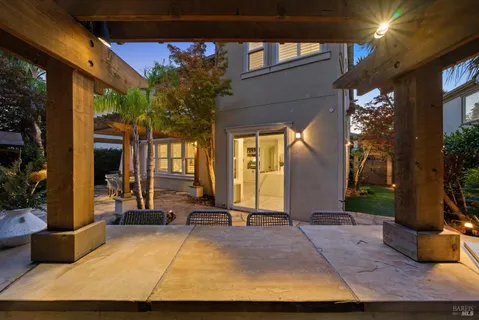 a bathroom with a sink mirror and vanity