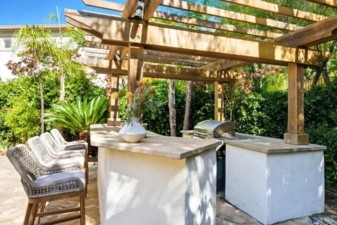 a bedroom with bed and a window