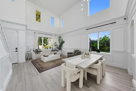 a kitchen with stainless steel appliances kitchen island granite countertop a sink and cabinets