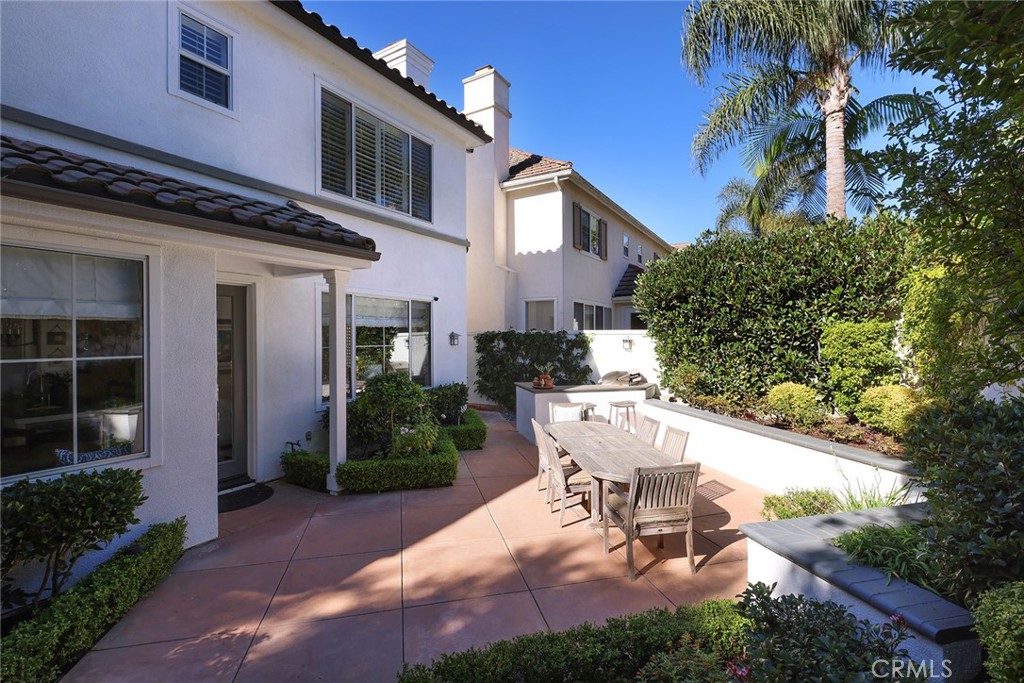9 Chaminade Newport Coast, CA 92657 - Photo 25 of 29 a view of a house with backyard and sitting area