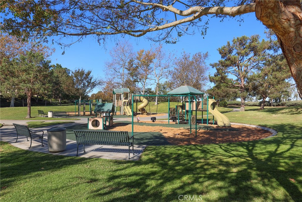 9 Chaminade Newport Coast, CA 92657 - Photo 28 of 29 a view of a garden with a bench